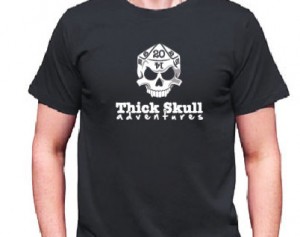 Proudly wear the Thick Skull Adventures logo atop a field of squidopede gray